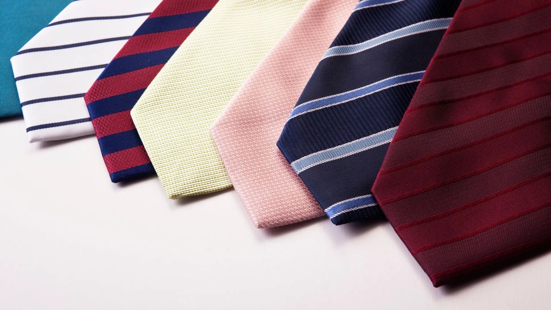 Width range of neckties for larger and taller men: Current trends and sizes